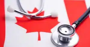 Stethoscope on top of the Canadian flag